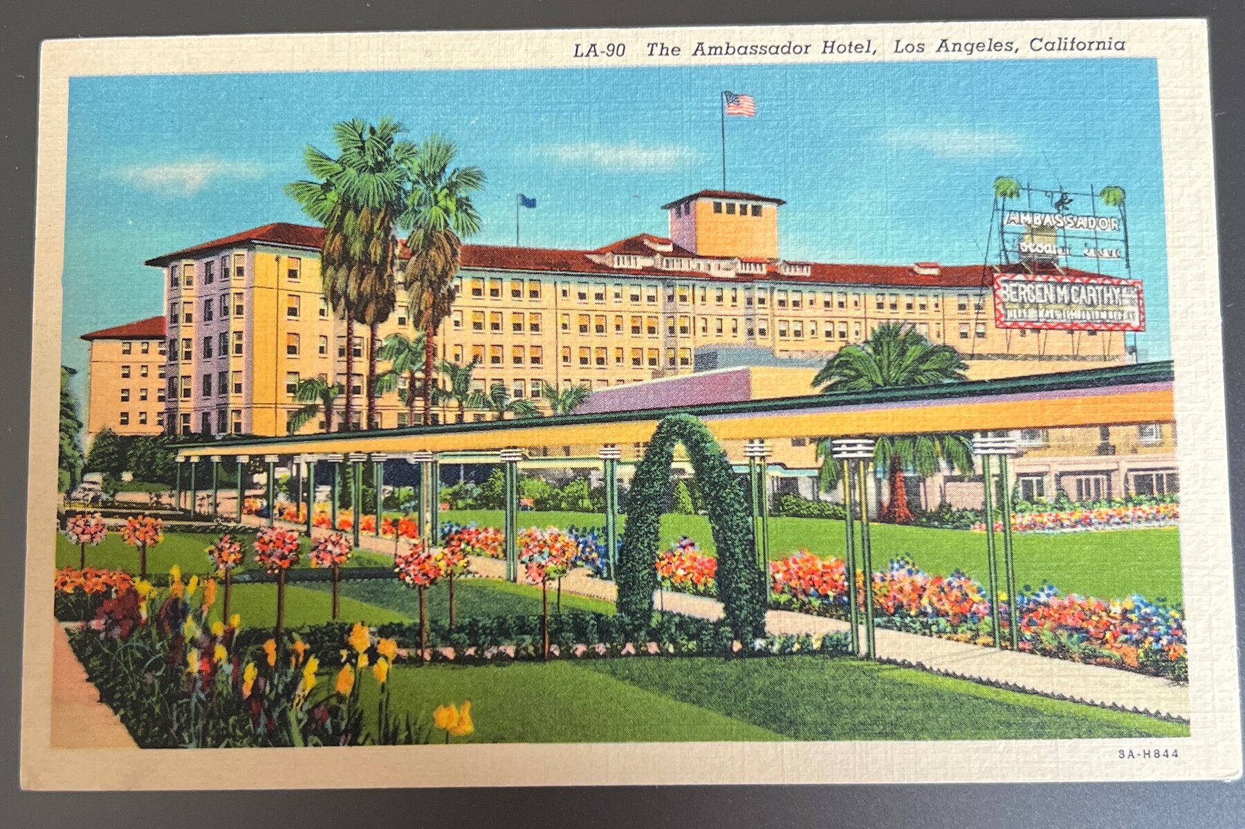 Postcard 1930s Linen Ambassador Hotel Los Angeles California Bergen McCarthy Sign
